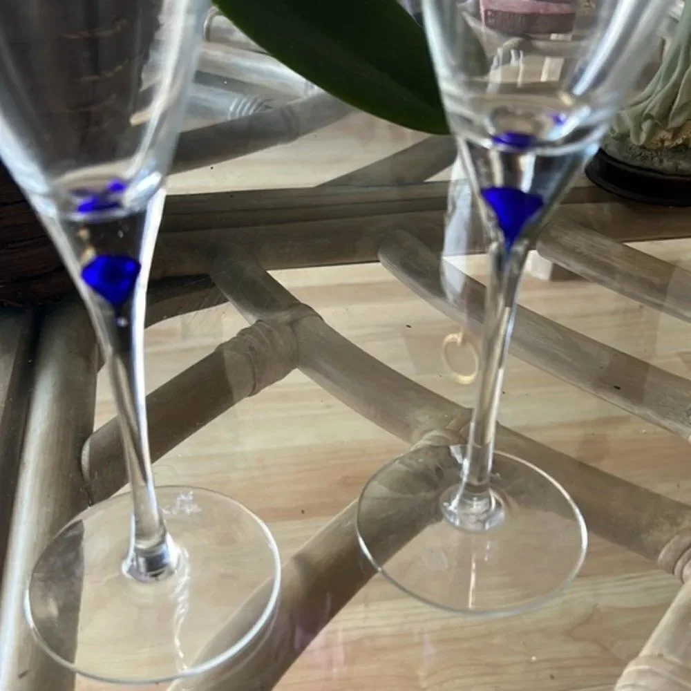 Crystal wine glasses with a  sapphire blue in stem.